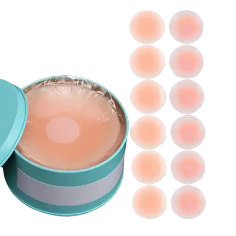Couvercles de mamelons en silicone dans un étui de rangement rond turquoise.